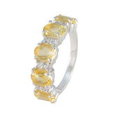 Stella sterling silver band with five oval yellow gemstones and diamond accents yellow gemstone ring